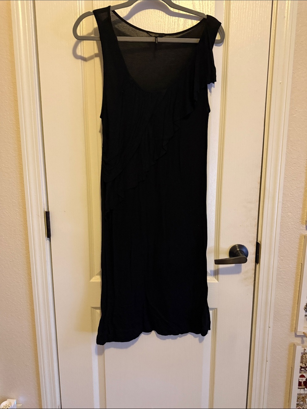 Sleeveless Black Midi Dress with Diagonal Ruffle